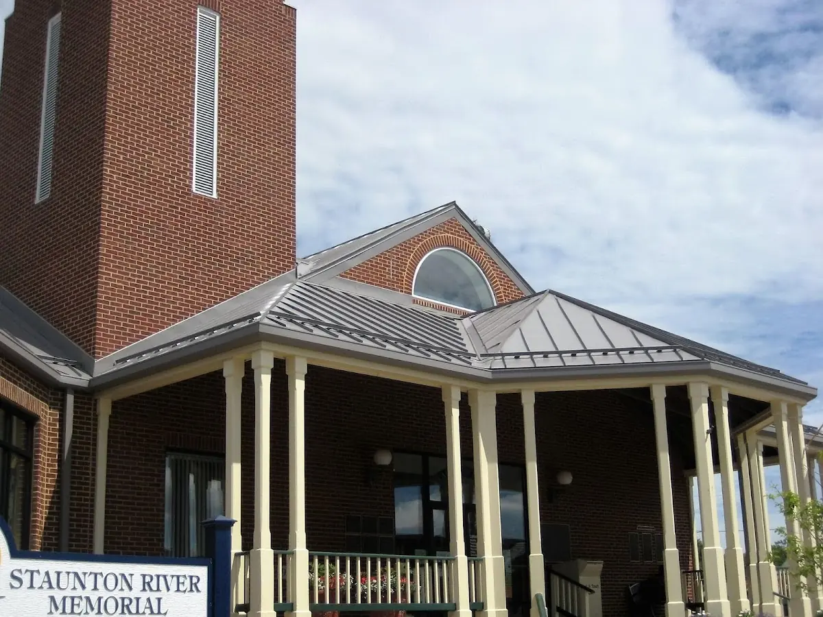 Skilled roofing craftsmen working on a residential roof in Wilkes-Barre